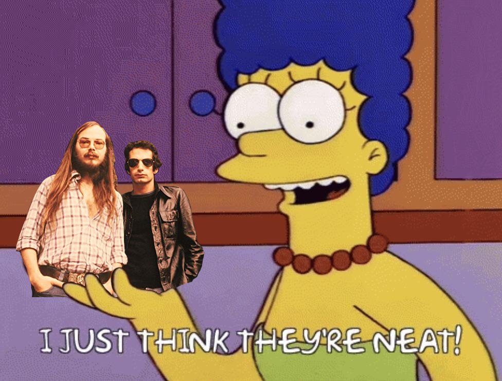 Marge Simpson holding Steely Dan songwriters Walter Brecker and Donald Fagen saying